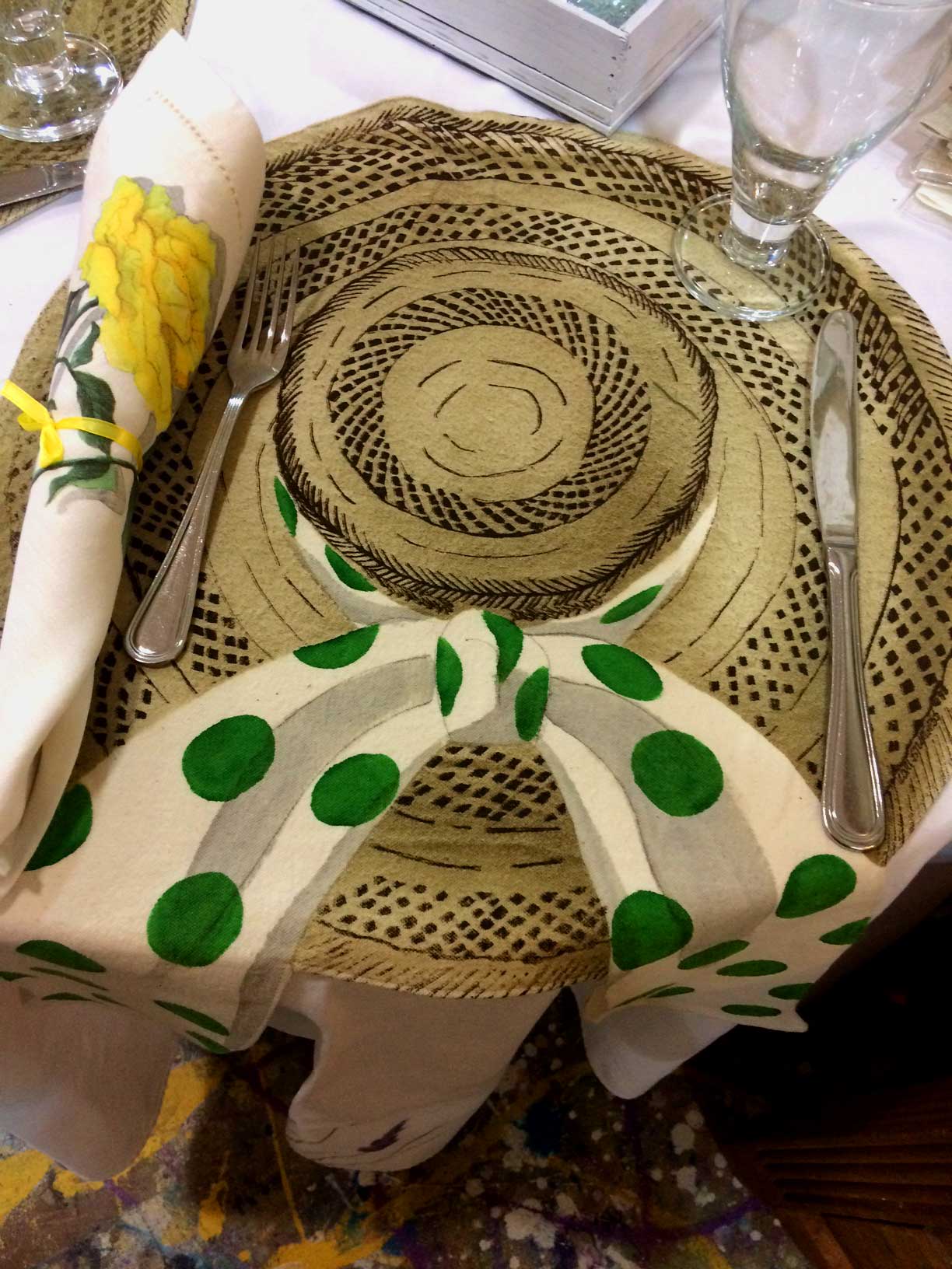 Custom painted “Hat Placemats” and rose napkins how cute! Recentered